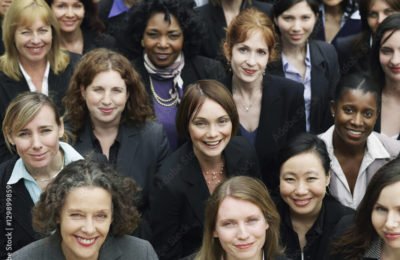 Women’s Role in Workplace: A large group of women posing for a click