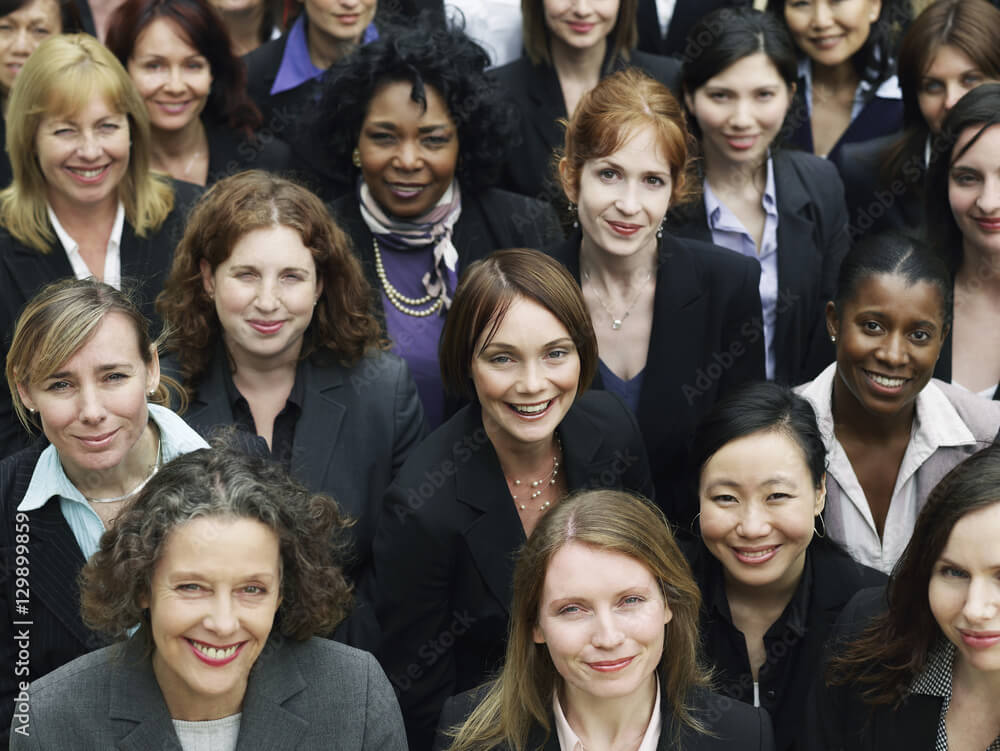 Women’s Role in Workplace: A large group of women posing for a click