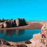 Λιβαισ:the Enigma: shot of a lake on the middle of a desert on a sunny day