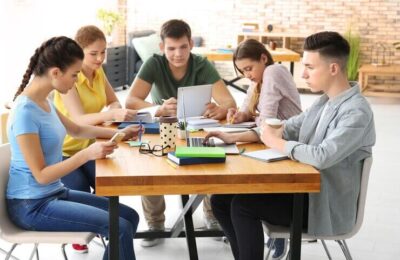Gimkit: group of teenagers studying indoors
