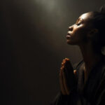 Spiritual black woman in prayer The concept of deep faith