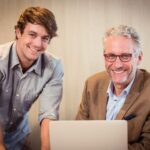 Portrait of businessmen smiling