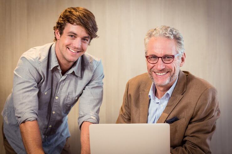 Portrait of businessmen smiling