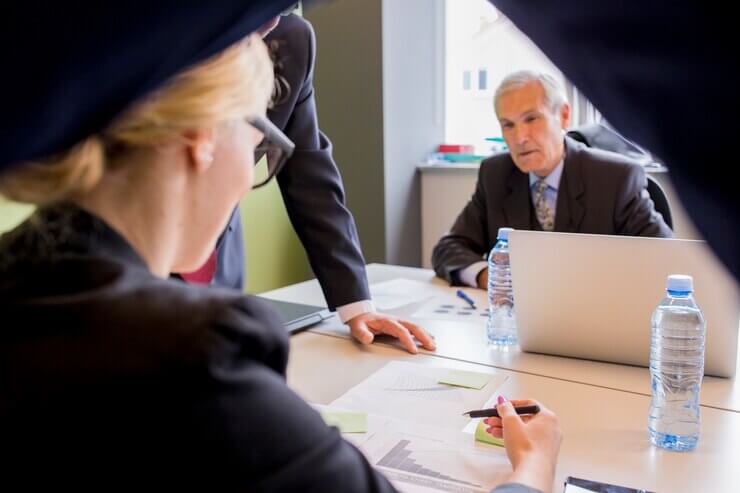 business people working and scrutiny