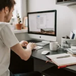 Photo Of Man Using Computer