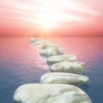 stepping-stones-ocean-against-sunset