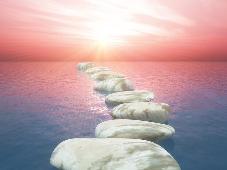 stepping-stones-ocean-against-sunset