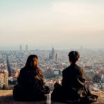 Romantic Couple Overlooking Barcelona Cityscape