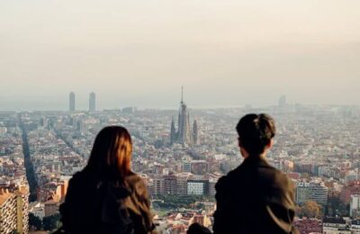 Romantic Couple Overlooking Barcelona Cityscape