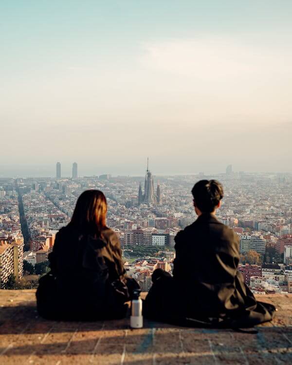 Romantic Couple Overlooking Barcelona Cityscape