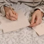 A Person Writing a Letter