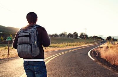 Backside of man with traveling, Facing Road,