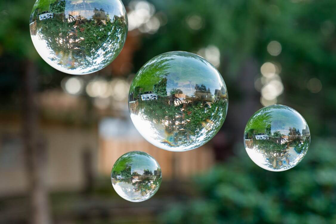 Floating Glass Spheres with Nature Reflection More info Share More like this