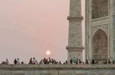 People on Concrete Building during Sunset