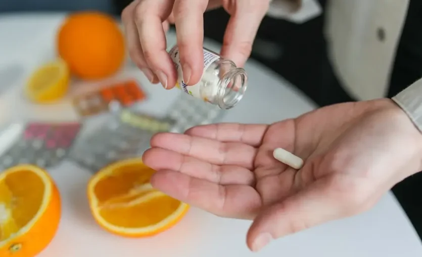 Person Taking Pill