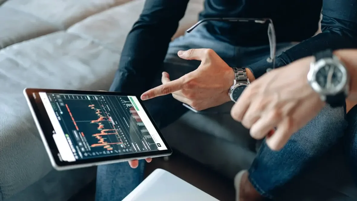 A Person Holding a Digital Tablet