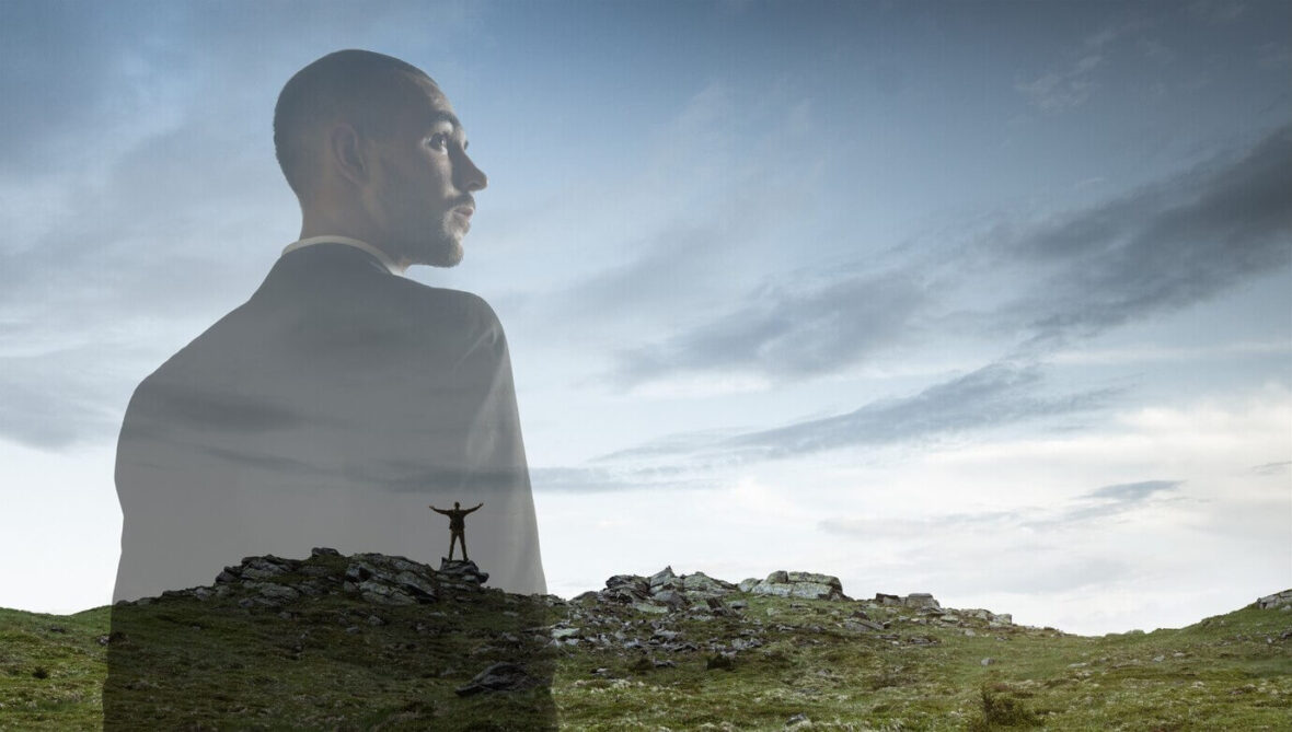 Businessman with landscapes on background, double exposure.