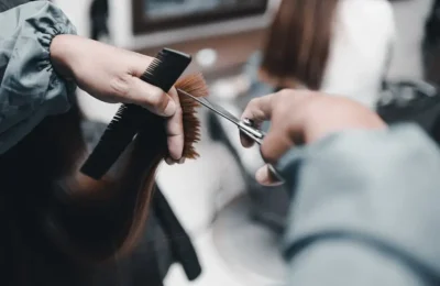 Hairdresser Cutting Hairs