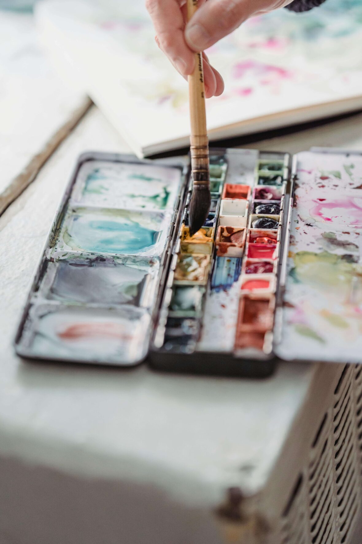 Top View of a Person Painting an Artwork More info Share More like this