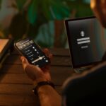 person-using-smartphone-his-automated-home