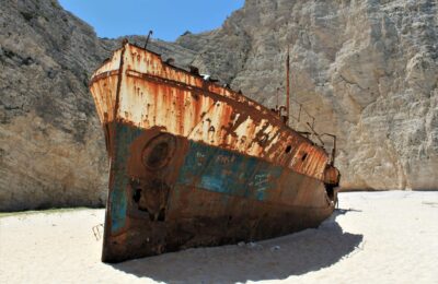 Broken ship beside the mountain
